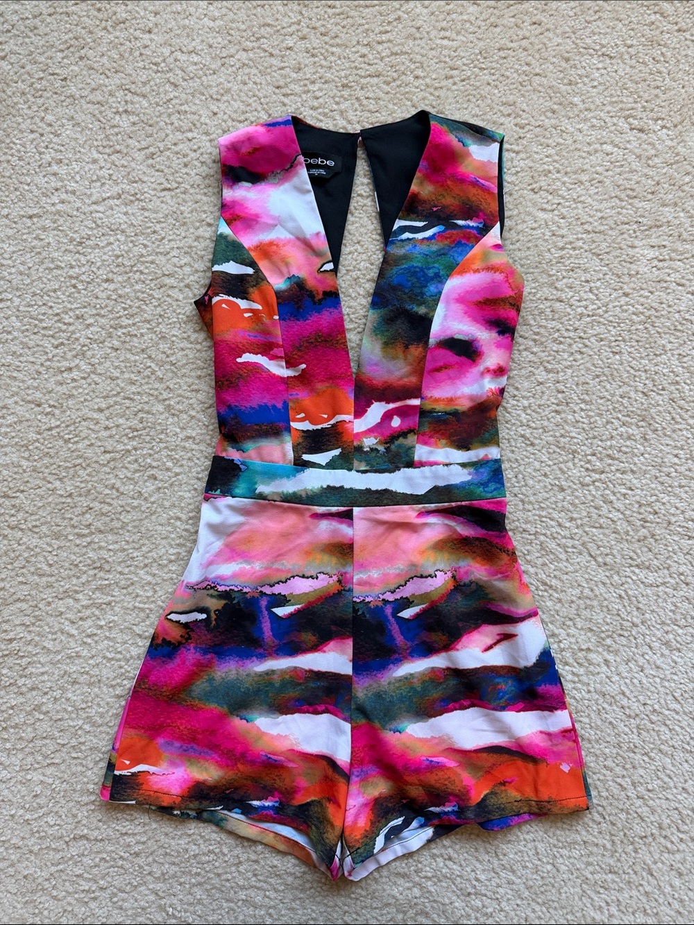 bebe Multicolor One-Shoulder Abstract Print Romper with Plunge